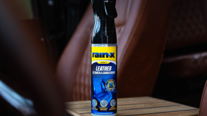 Bottle of leather cleaner inside a car